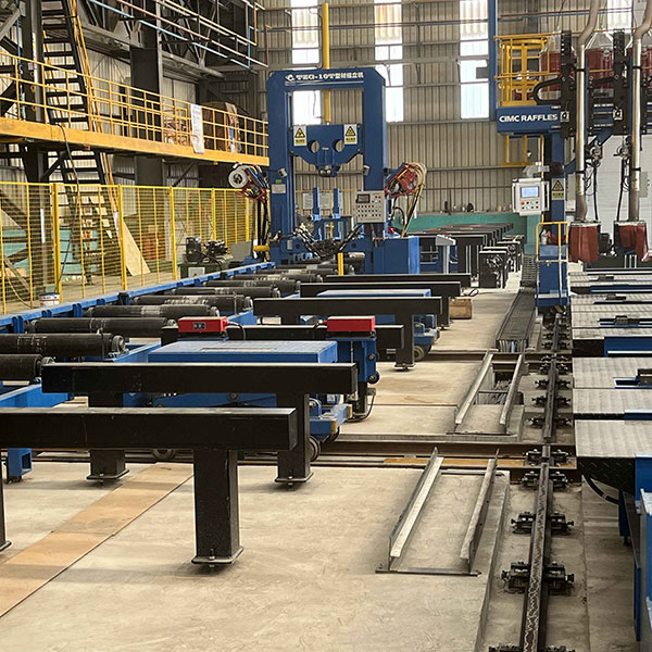 Como as linhas de soldagem de viga T melhoram a eficiência da fabricação?